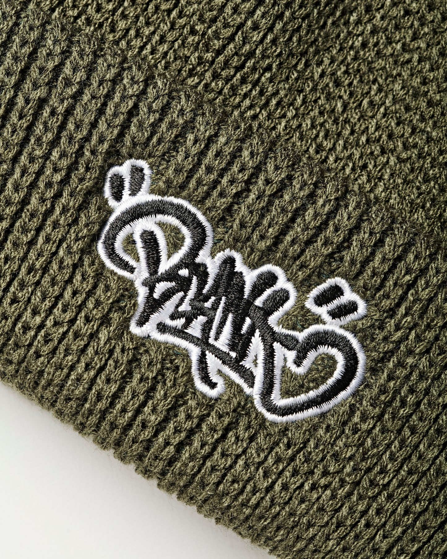 UPLIFT TAG CABLE KNIT BEANIE - ARMY